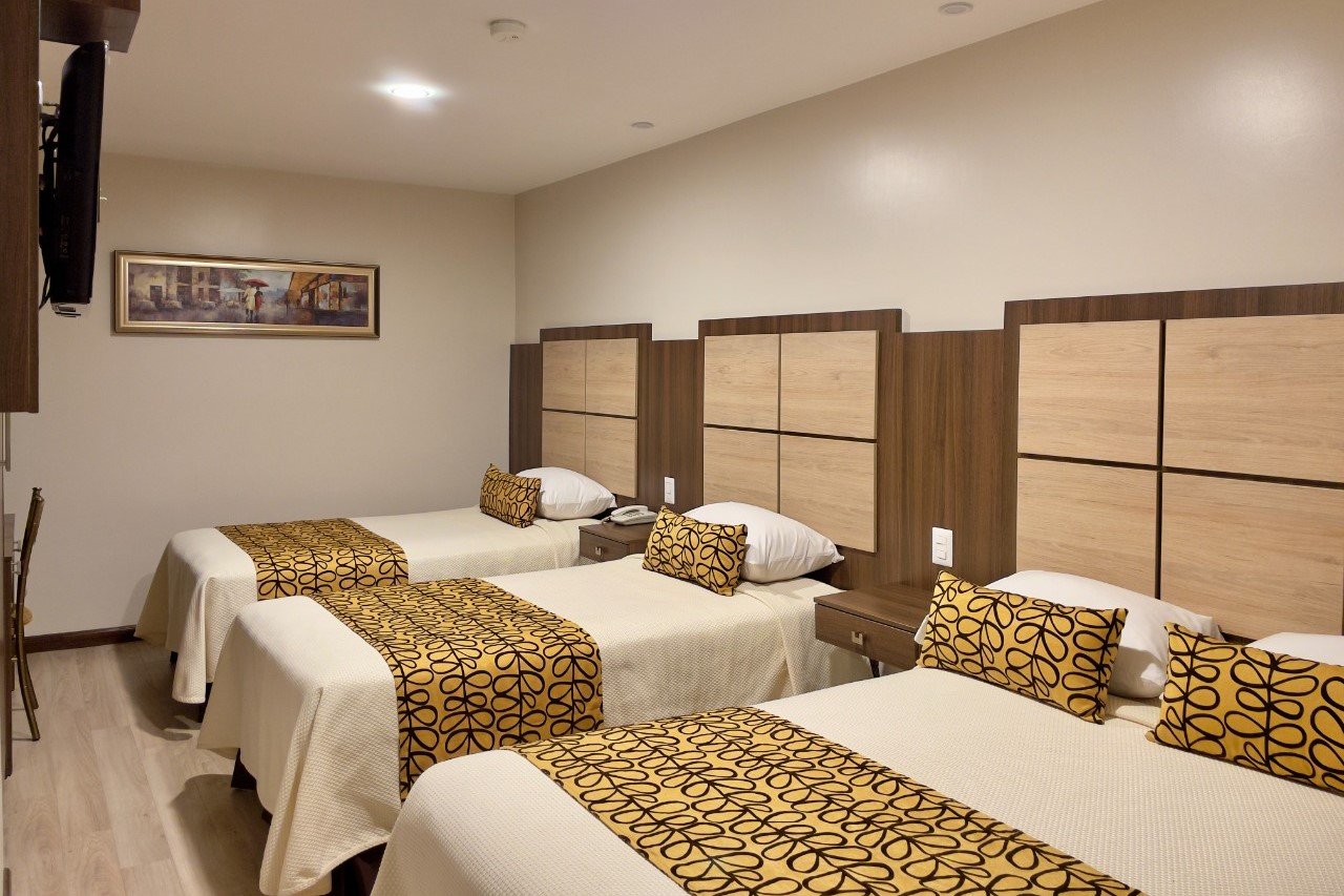 Habitación Triple - Hotel Oasis